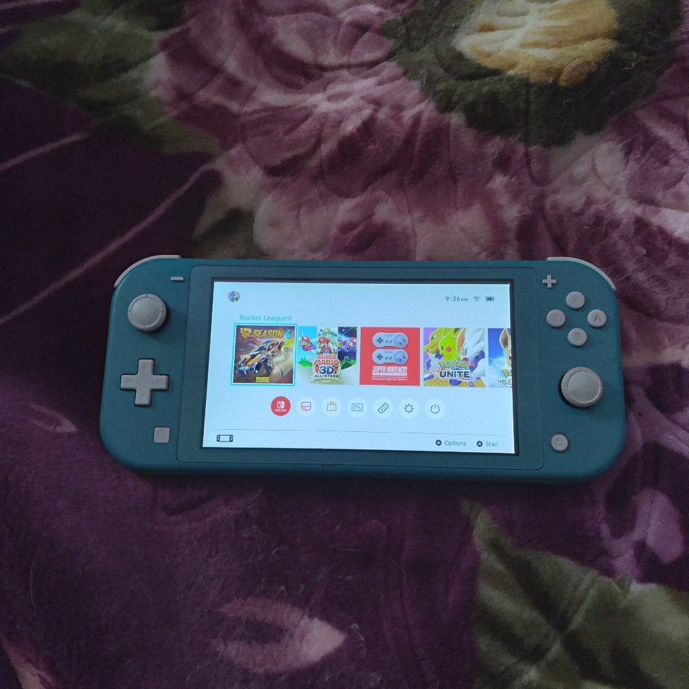 Nintendo switch lite and a video game